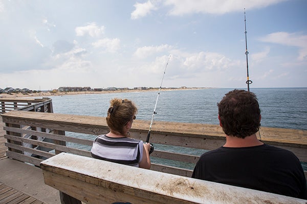 Unidentified people fishing on Jeanette's Pier in Nags Head
