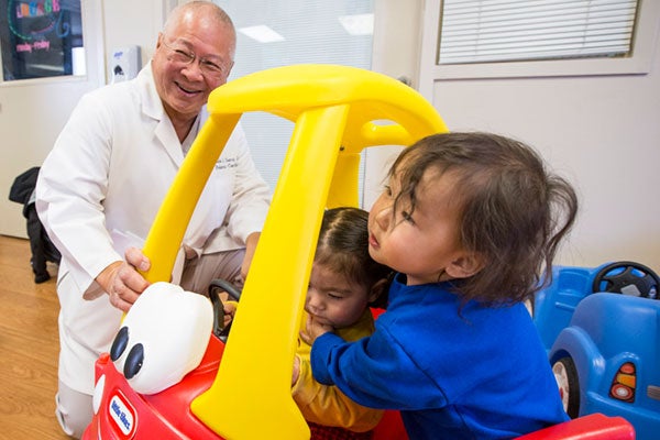 Doctor playing with pediatric patients